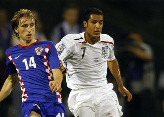 Luka Modrić i Theo Walcott