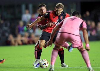 Lionel Messi i Matko Miljević