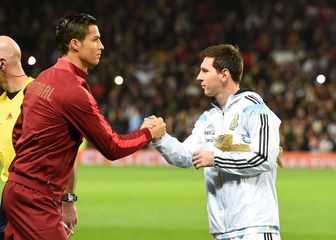 Cristiano Ronaldo i Lionel Messi (Foto: Martin Rickett/Press Association/PIXSELL