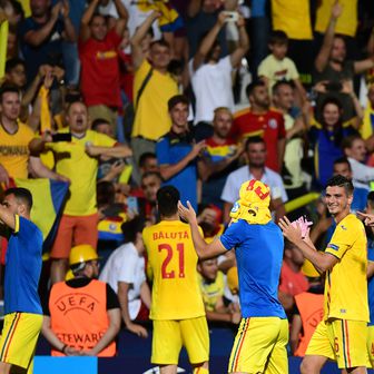 Slavlje rumunjskih igrača i navijača (Foto: AFP)