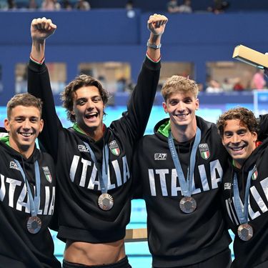 Plivač je tijekom dodjele medalja slučajno otkrio trbušnjake