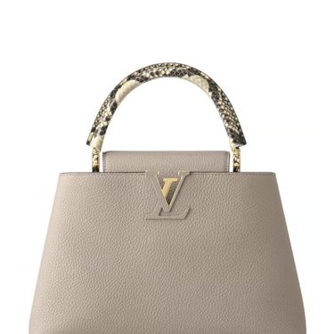 Zagrebačka street stylerica nosi torbu modne kuće Louis Vuitton