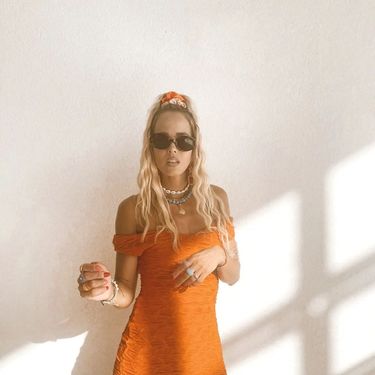 Antonija Mišura Sandrić u narančastoj haljini iz Zare