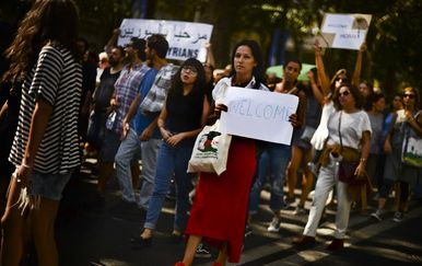 Portugalci izražavaju dobrodošlicu useljenicima (Foto: AFP
