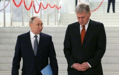 Vladimir Putin i Dmitrij Peskov