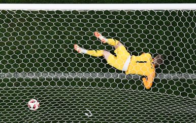 Hrvatski gol za izjednačenje protiv Engleza (Foto: AFP)
