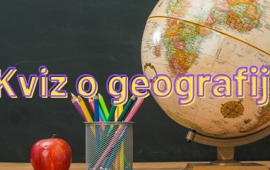 Jabuka, uredski pribor i globus na stolu te natpis kviz o geografiji