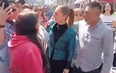 Nepoznati muškarac s predsjednicom