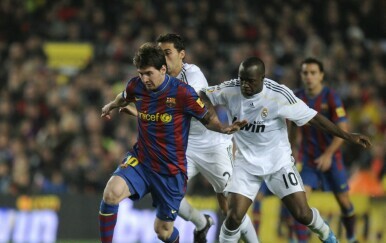 Lionel Messi i Lassana Diarra