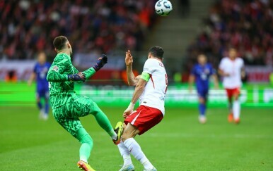 Dominik Livaković i Robert Lewandowski