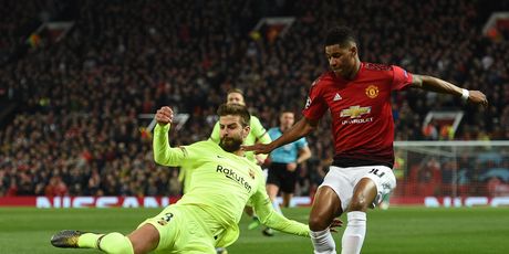 Gerard Pique i Marcus Rashford (Foto: AFP)