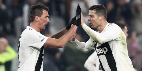 Mario Mandžukić i Cristiano Ronaldo (Foto: AFP)