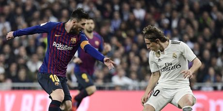 Lionel Messi i Luka Modrić (Foto: AFP)