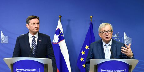 Borut Pahor i Jean-Claude Juncker (Foto: AFP)