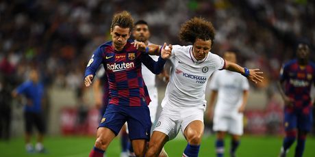 Antoine Griezmann i David Luiz (Foto: AFP)