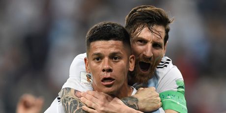 Marcos Rojo i Lionel Messi (Foto: AFP)