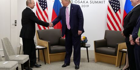 Vladimir Putin i Donald Trump (Foto: Mikhail KLIMENTYEV / SPUTNIK / AFP)