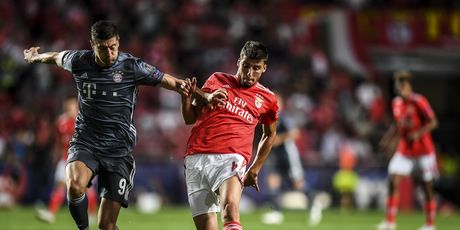 Ruben Dias i Robert Lewandowski (Foto: AFP)