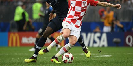 Ivan Rakitić i Paul Pogba (Foto: AFP)