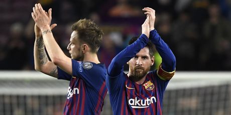 Ivan Rakitić i Lionel Messi (Foto: AFP)