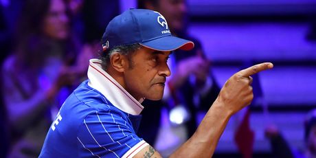 Yannick Noah slavi poen (Foto: AFP)