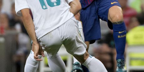Luka Modrić i Lionel Messi (Foto: AFP)