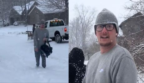 Dostavljač pizze nakon dostave kako prolazi kroz duboki snijeg