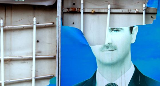Poderani poster odbjeglog sirijskog predsjednika Bašara al-Asada