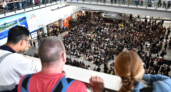 Međunarodna zračna luka u Hong Kongu (Foto: Anthony WALLACE / AFP)
