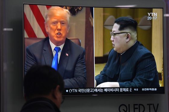Donald Trump i Kim Jong Un (Foto: AFP)