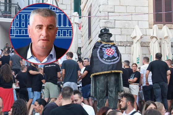 Miro Bulj i spomenik Tina Ujevića ogrnut u zastavu HOS-a