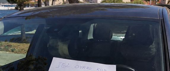 Poruka ispod brisača
