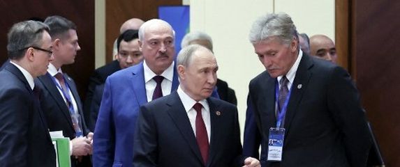 Dmitrij Peskov i Vladimir Putin