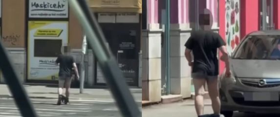 Muškarac kako hoda Zagrebom sa spuštenim hlačama