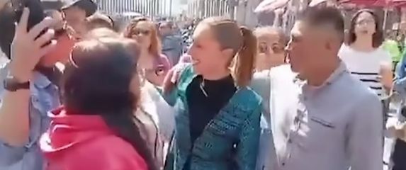 Nepoznati muškarac s predsjednicom