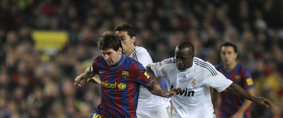 Lionel Messi i Lassana Diarra