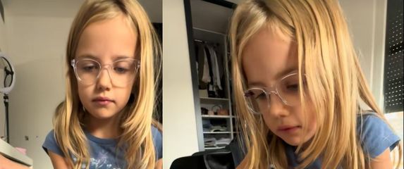 Djevojčica piše zadaću