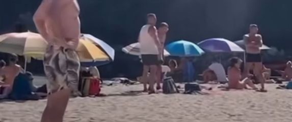 Tate na plaži