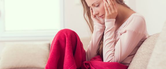 Žena s glavoboljom