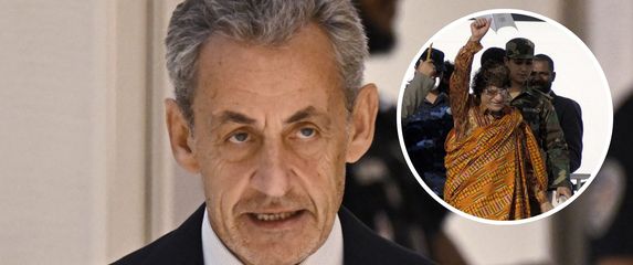 Nicolas Sarkozy i Muammar al-Gaddafi