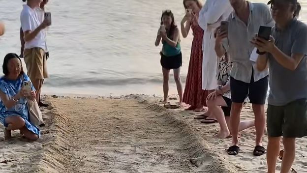 Turisti na plaži