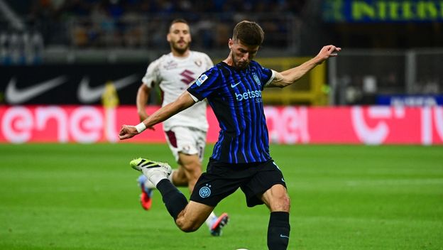 Petar Sučić, u pozadini Nikola Vlašić