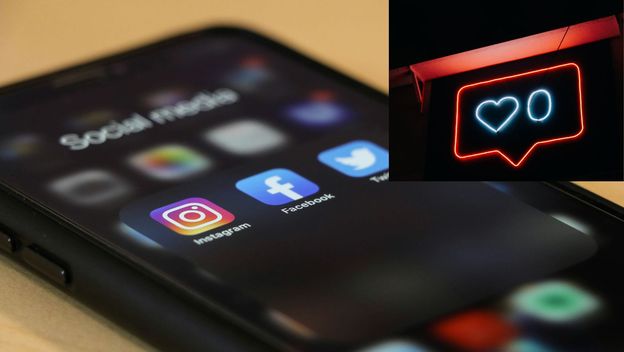 mobitel s aplikacijama društvenih mreža i simbol za like u kutu