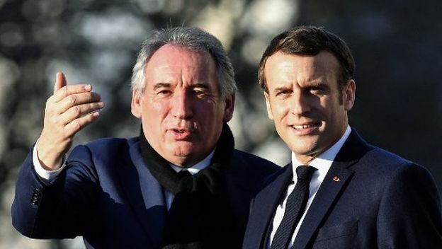 Francois Bayrou i Emmanuel Macron