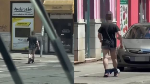 Muškarac kako hoda Zagrebom sa spuštenim hlačama