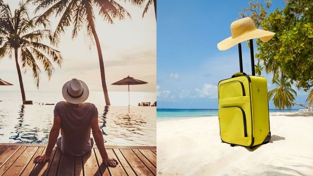 Muškarac na putovanju i kofer sa šeširom na plaži