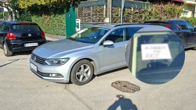 Nepropisno parkirano vozilo i natpis na staklu