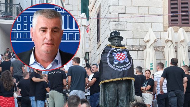 Miro Bulj i spomenik Tina Ujevića ogrnut u zastavu HOS-a