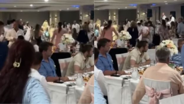 Ljudi na svadbi i dijete koja spava