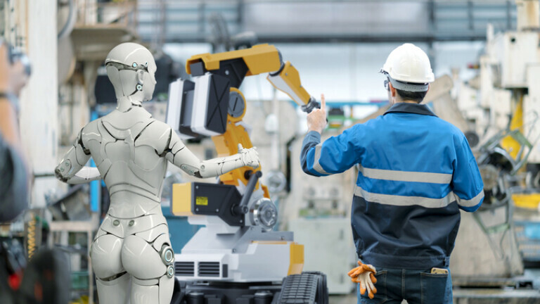 Humanoidni robot u interakciji s radnikom, ilustracija